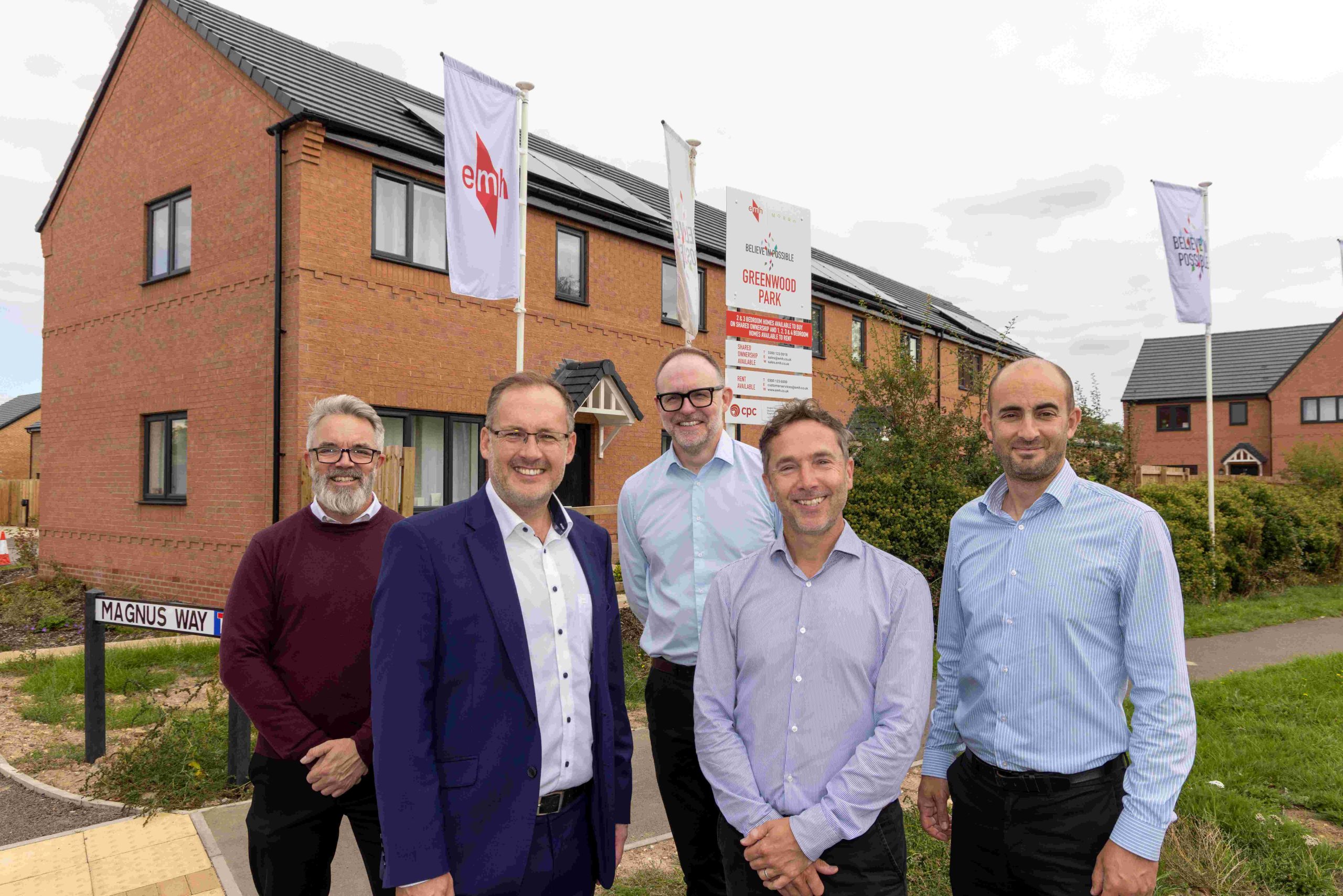team infront of the new development